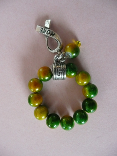 Bague perles magiques et breloque