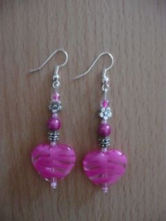 Boucles d'oreilles coeurs roses