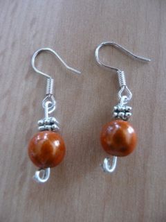 Petites boucles d'oreilles orange